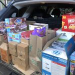 picture of food and supplies in a trunk